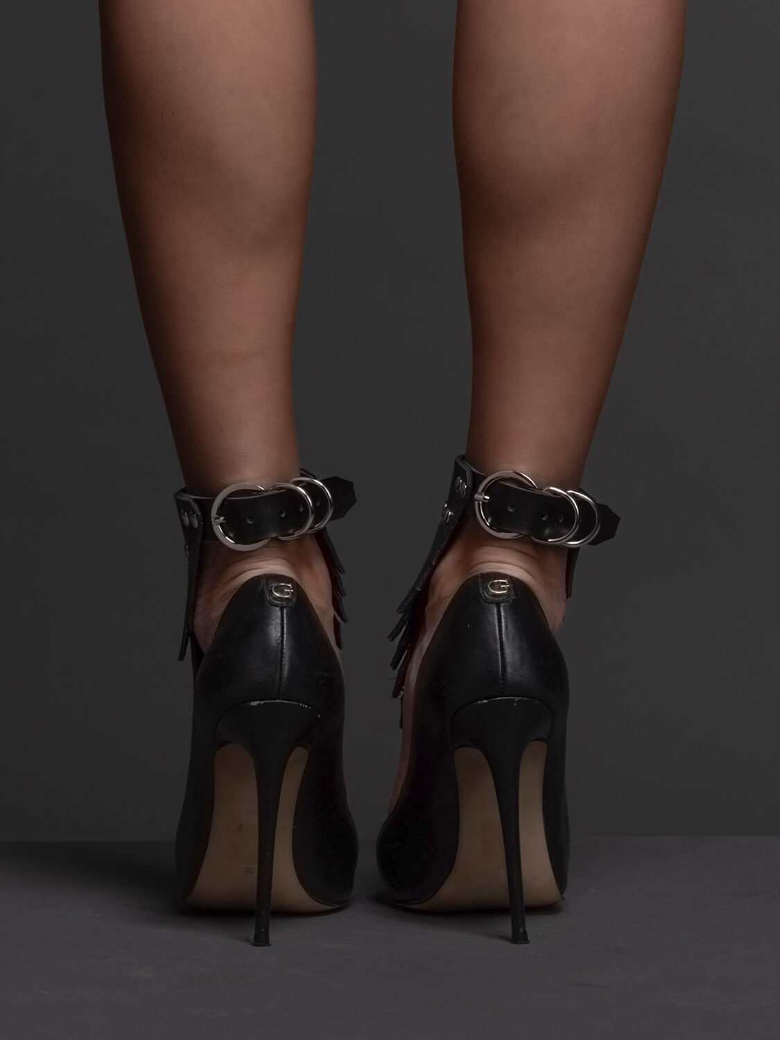 Real leather ankle cuffs fringe black front VoyeurX